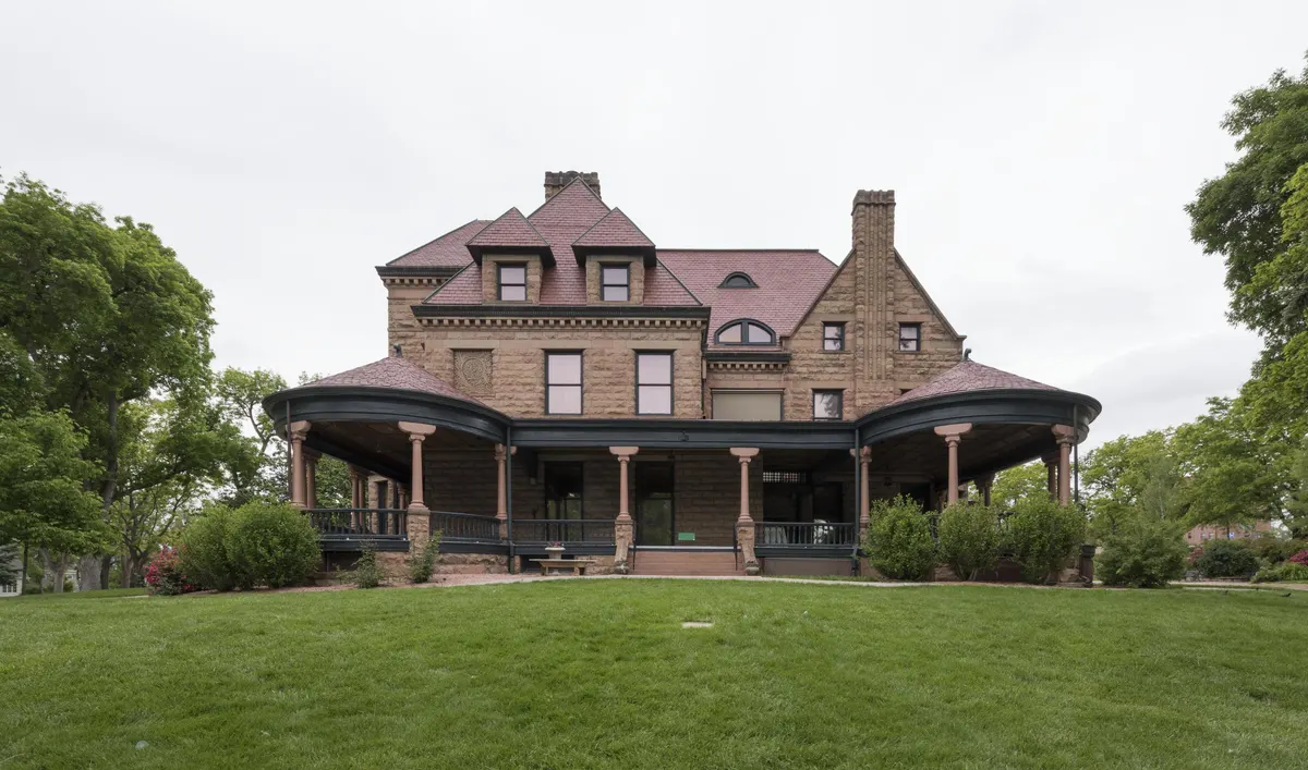 The front of Rosemount with its curved veranda and dormered roof